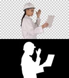 Woman engineer with tablet making video call, Alpha Channel royalty free stock photography Woman engineer with tablet making video call, Alpha Channel royalty free stock photography