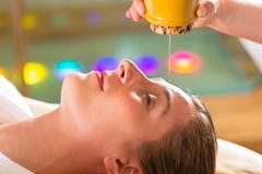 Woman enjoying a Ayurveda oil massage