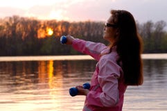 Woman Exercising in the Nature royalty free stock photo Woman Exercising in the Nature royalty free stock photo