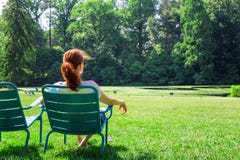 Woman in eyeglasses relax on greenfield. royalty free stock photos Woman in eyeglasses relax on greenfield. royalty free stock photos