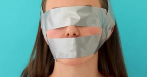 woman-eyes-mouth-covered-adhesive-tape-p