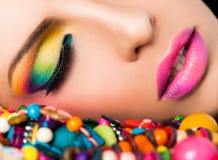 Woman face colourful make-up lips
