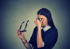 Woman with glasses rubbing her eyes feels tired royalty free stock image Woman with glasses rubbing her eyes feels tired royalty free stock image