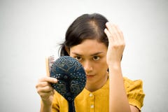 Woman with hair loss problem