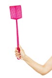 Woman hand holding a flyswatter