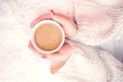Woman Hands Holding A Cup Of Hot Coffee, Espresso On A Winter, Cold Day Stock Photography Woman Hands Holding A Cup Of Hot Coffee, Espresso On A Winter, Cold Day Stock Photography