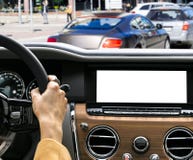 Woman hands holding car steering wheel of a modern car. Hands on steering wheel of a car driving. Girl driving a car inside cabin. royalty free stock photography Woman hands holding car steering wheel of a modern car. Hands on steering wheel of a car driving. Girl driving a car inside cabin. royalty free stock photography