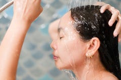 Woman happy in shower at bathroom stock images Woman happy in shower at bathroom stock images
