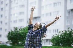 Woman Happy Smiling Happiness Hands Outstretched Toward The Rain Stock Images Woman Happy Smiling Happiness Hands Outstretched Toward The Rain Stock Images