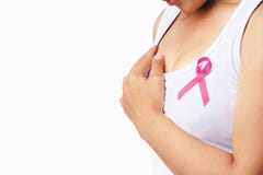 Woman holding breast with pink ribbon