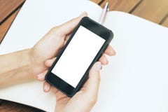 Woman holding cellphone Stock Photos Woman holding cellphone Stock Photos