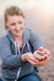 Woman holding pile of stones royalty free stock images Woman holding pile of stones royalty free stock images
