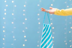 Woman holding a shopping bag stock photo Woman holding a shopping bag stock photo