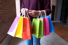 Woman holding shopping bag on vintage street in shopping mall, s royalty free stock images Woman holding shopping bag on vintage street in shopping mall, s royalty free stock images