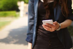 Woman Holding White Smartphone Stock Images Woman Holding White Smartphone Stock Images