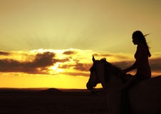 Woman and Horse Watching Sunset Silhouette royalty free stock images Woman and Horse Watching Sunset Silhouette royalty free stock images