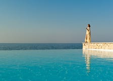 Woman in indian dress stand near pool royalty free stock photo Woman in indian dress stand near pool royalty free stock photo