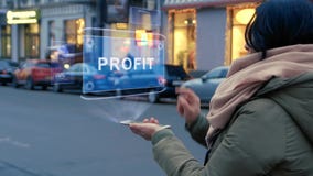 Woman interacts hologram Profit