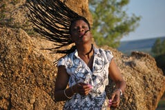 A woman just cant get enough of her beautiful dreadlocks