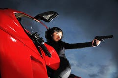 Woman Killer/ Agent on a motorbike stock photography Woman Killer/ Agent on a motorbike stock photography