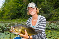 Woman Large Mouth Bass Fishing royalty free stock image Woman Large Mouth Bass Fishing royalty free stock image