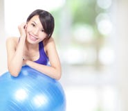 Woman leaning on a pilates ball Stock Image Woman leaning on a pilates ball Stock Image