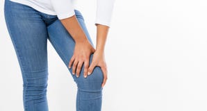Woman with leg pain, girl suffering from knee pain isolated on white background, female rheumatism stock photography Woman with leg pain, girl suffering from knee pain isolated on white background, female rheumatism stock photography