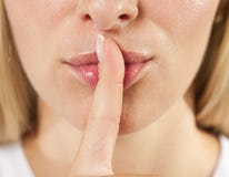 Woman Lips With Finger Shh Stock Photos