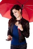 Woman Looking Down Phone Umbrella royalty free stock images Woman Looking Down Phone Umbrella royalty free stock images