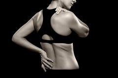 Woman with Lower Back and Shoulder Pain stock photos Woman with Lower Back and Shoulder Pain stock photos