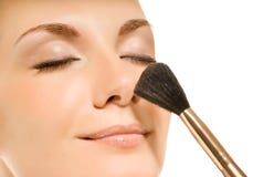 Woman with a make-up brush