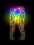 Woman and man silhouette with aura, chakras, energy