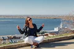 Woman meditating on the waterfront royalty free stock image Woman meditating on the waterfront royalty free stock image