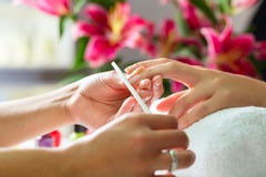 Woman in nail salon receiving manicure stock photos Woman in nail salon receiving manicure stock photos