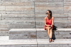 https://thumbs.dreamstime.com/t/woman-new-york-relaxing-bench-high-line-laughing-happy-holding-mobile-phone-using-smartphone-app-summer-travel-92091243.jpg