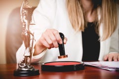 Woman Notary Public stamping the Power of attorney royalty free stock photo Woman Notary Public stamping the Power of attorney royalty free stock photo
