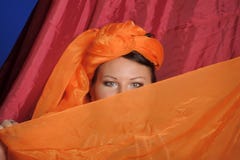 Woman in oriental clothes covering her face royalty free stock photo Woman in oriental clothes covering her face royalty free stock photo