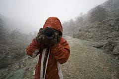 Woman photographer in the moutains Royalty Free Stock Photo Woman photographer in the moutains Royalty Free Stock Photo