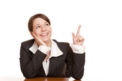 Woman Points And Looks Up At Blank Ad Space Royalty Free Stock Photography