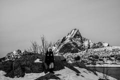 Woman posing in the mountains of the Lofoten Islands. Reine, Norway royalty free stock photos Woman posing in the mountains of the Lofoten Islands. Reine, Norway royalty free stock photos