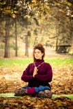 Woman practice yoga in autumn park stock images Woman practice yoga in autumn park stock images