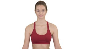 Woman practicing yoga meditation smiling on white background. stock video footage Woman practicing yoga meditation smiling on white background. stock video footage