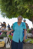 Woman bought fresh catched fish on tropical market on Island in Pacific Ocean royalty free stock photo Woman bought fresh catched fish on tropical market on Island in Pacific Ocean royalty free stock photo