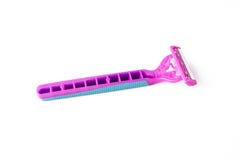 Woman razor for legs on the white background. Female shaver. royalty free stock images Woman razor for legs on the white background. Female shaver. royalty free stock images