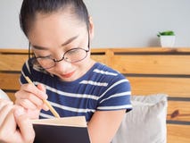 Woman is reading book on the bed. royalty free stock image Woman is reading book on the bed. royalty free stock image