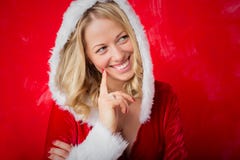 Woman in red Santa costume thinking royalty free stock images Woman in red Santa costume thinking royalty free stock images