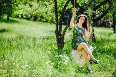 Woman ride on a swing royalty free stock image Woman ride on a swing royalty free stock image