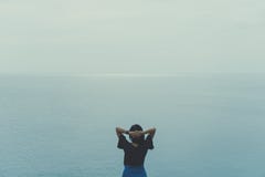 Woman rise hands up to sky freedom concept. stock photo Woman rise hands up to sky freedom concept. stock photo