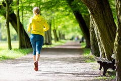 Woman Runner Running Jogging In Summer Park Royalty Free Stock Images