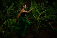 Woman Running In The Tropic Forest Stock Images